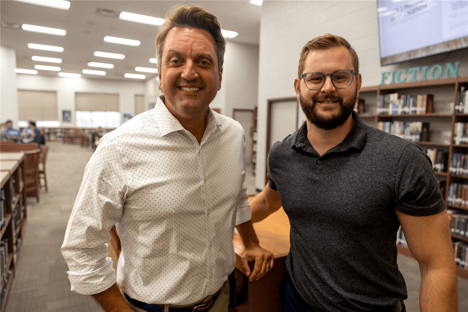 Principal and Assistant Principal smiling